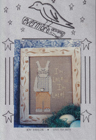 Cross Stitch chart of a rabbit that is title I'm Late I'm Late.