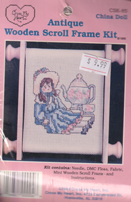 China Doll  -  Antique Wooden Scroll Frame  Cross Stitch Kit CSK-85