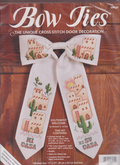 Southwestern Welcome Bow Tie Door Decoration. It is a Cross Stitch Kit by Michael A LeClair.